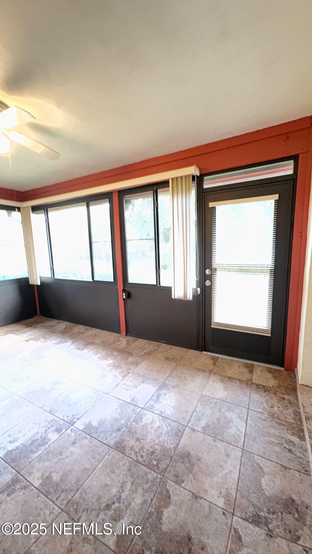 18 Warren Place Palm Coast, FL 32164 - Photo 24 of 26 sunroom 2