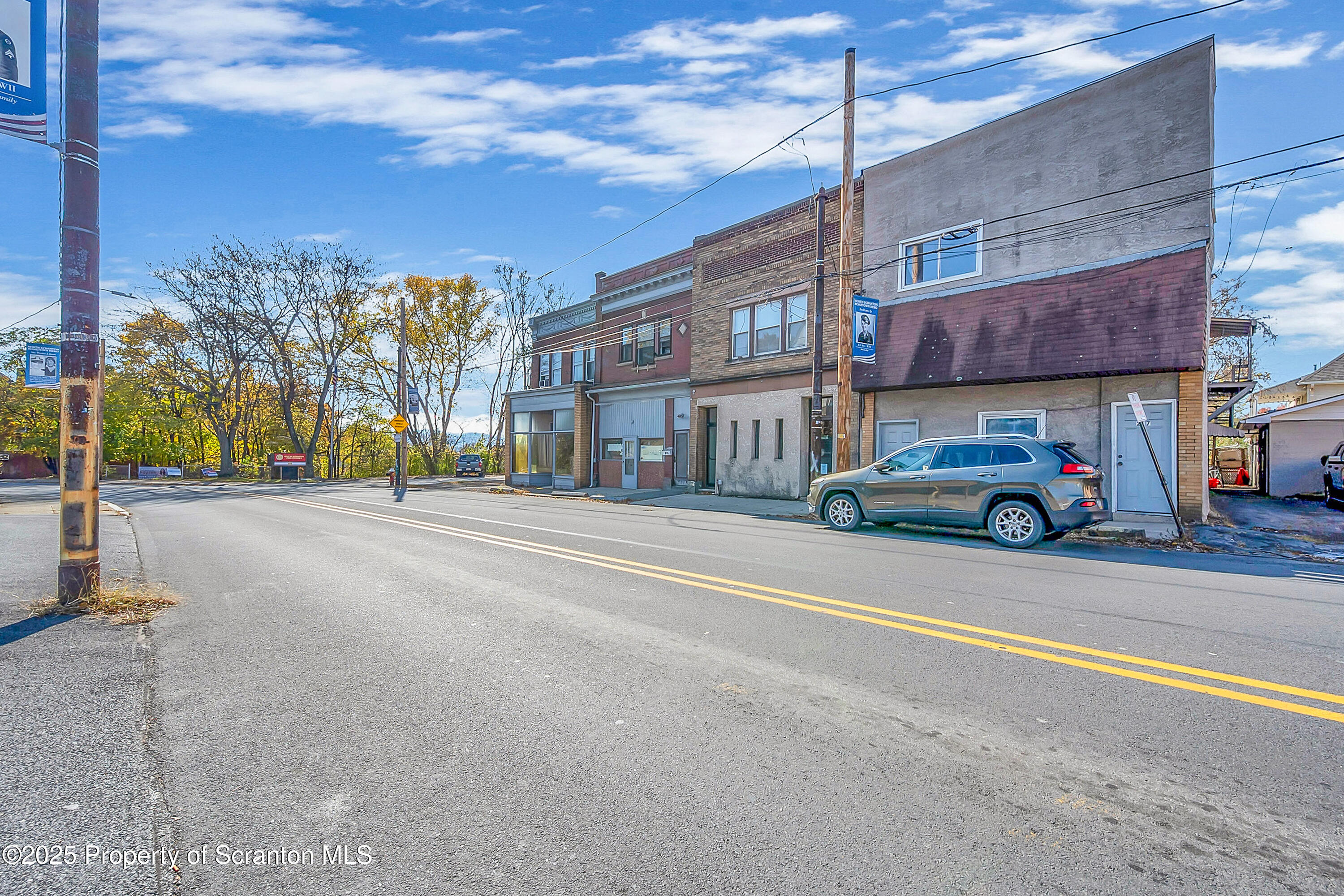 213 West Market Street Scranton, PA 18508 - Photo 6 of 7 a car parked on the side of a street