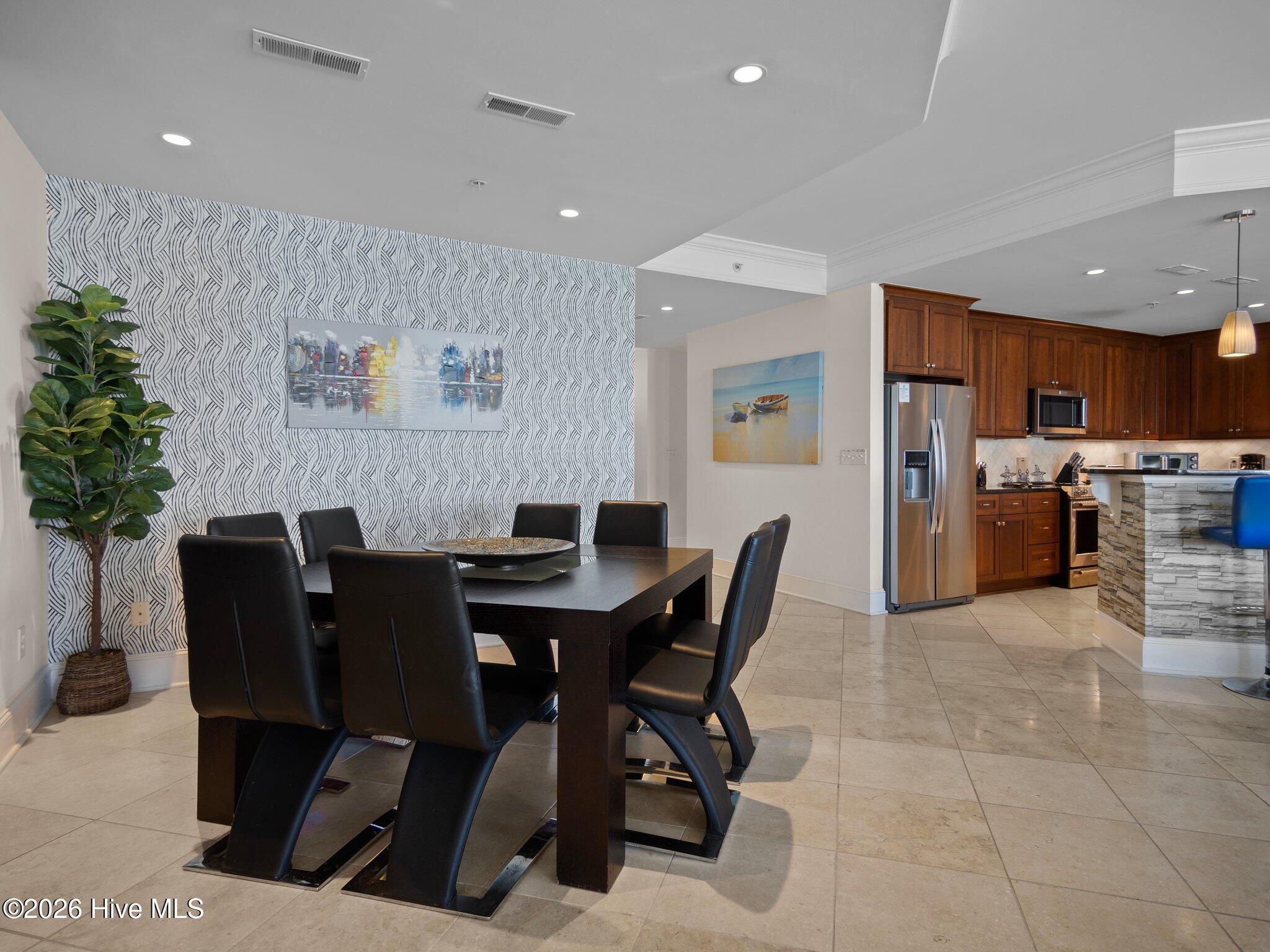 1435 Salter Path Road, Unit K3 Indian Beach, NC 28512 - Photo 10 of 22 Dining area looking into kitchen
