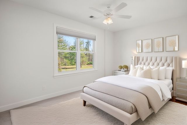 a view of a hallway with washer and dryer