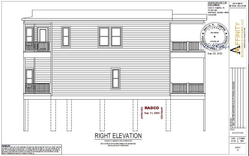 1147 Basque Lane Cudjoe, FL 33042 - Photo 8 of 13 a view of a living room with a white wall