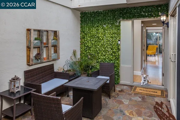 an outdoor space with patio and a couch