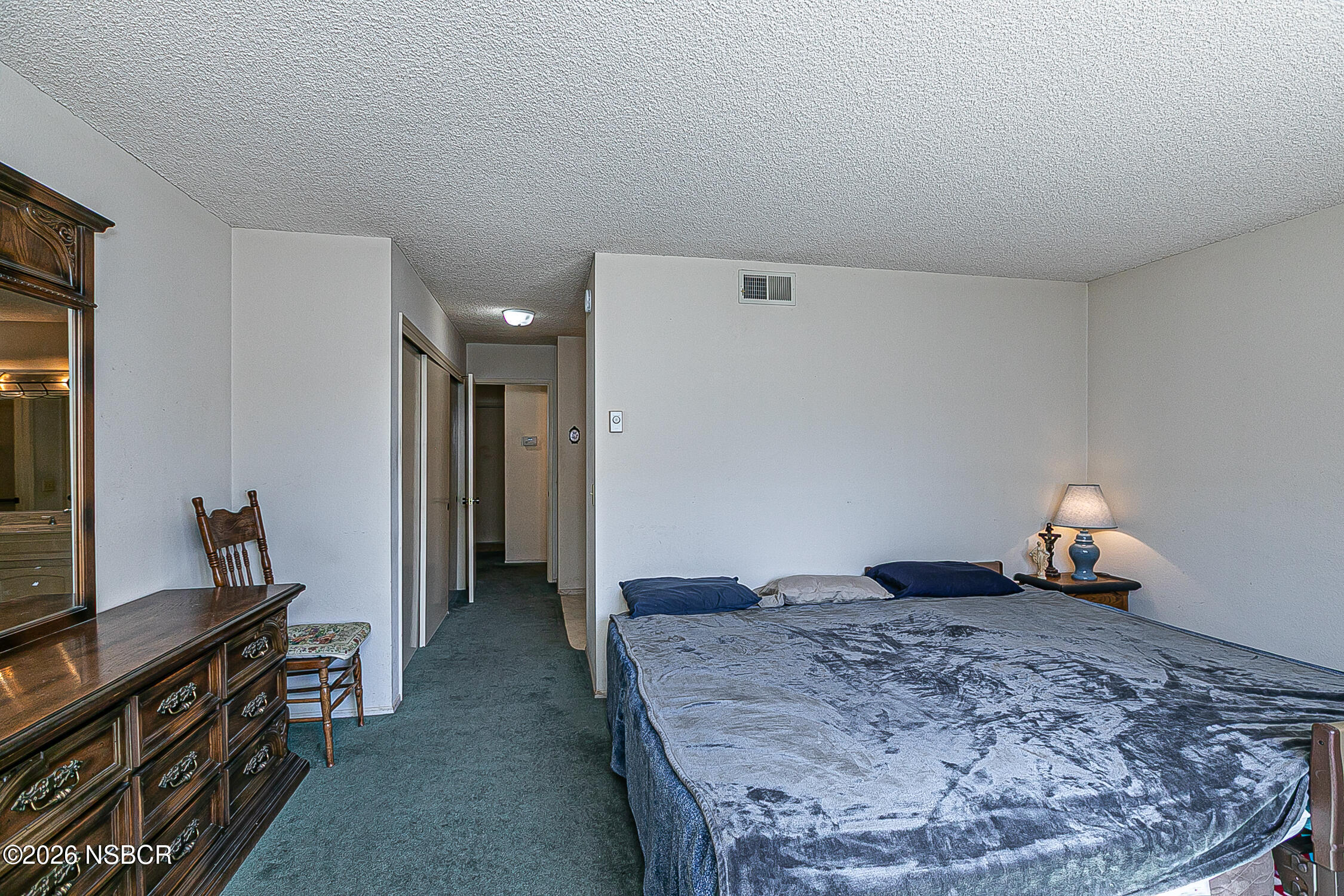 4447 Falcon Drive Lompoc, CA 93436 - Photo 13 of 25 a living room with a bed and furniture