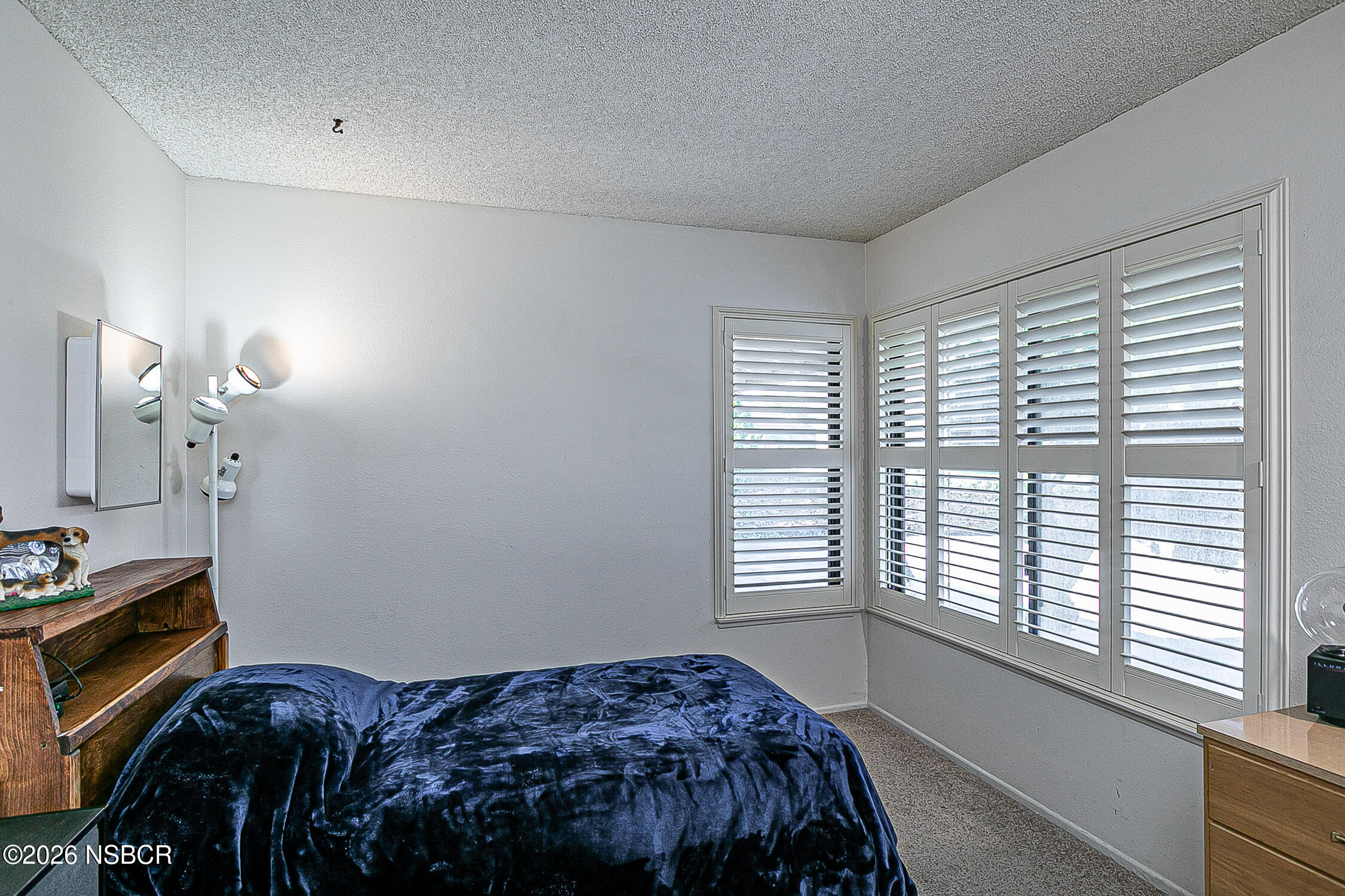 4447 Falcon Drive Lompoc, CA 93436 - Photo 19 of 25 a bedroom with a bed and a window