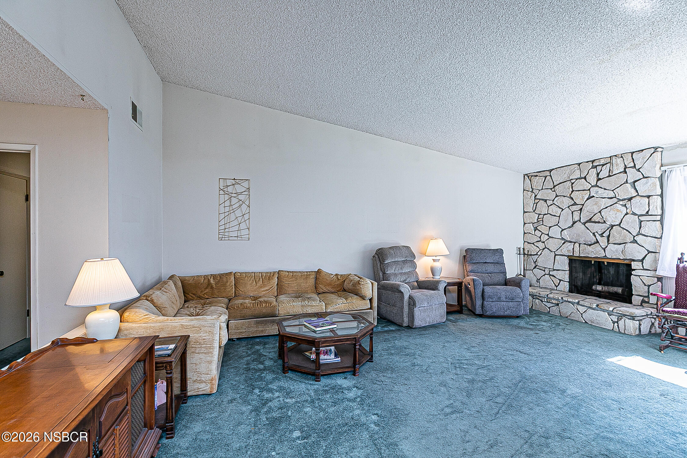 4447 Falcon Drive Lompoc, CA 93436 - Photo 2 of 25 a living room with furniture and a fireplace
