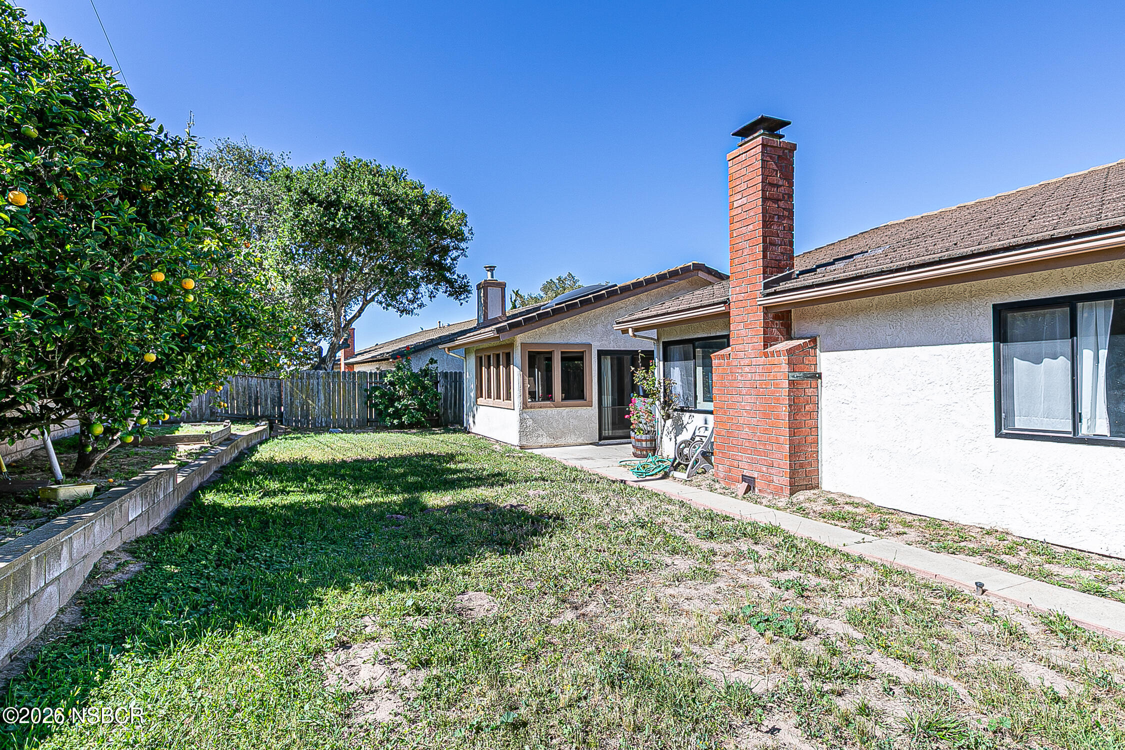 4447 Falcon Drive Lompoc, CA 93436 - Photo 22 of 25 a front view of a house with garden