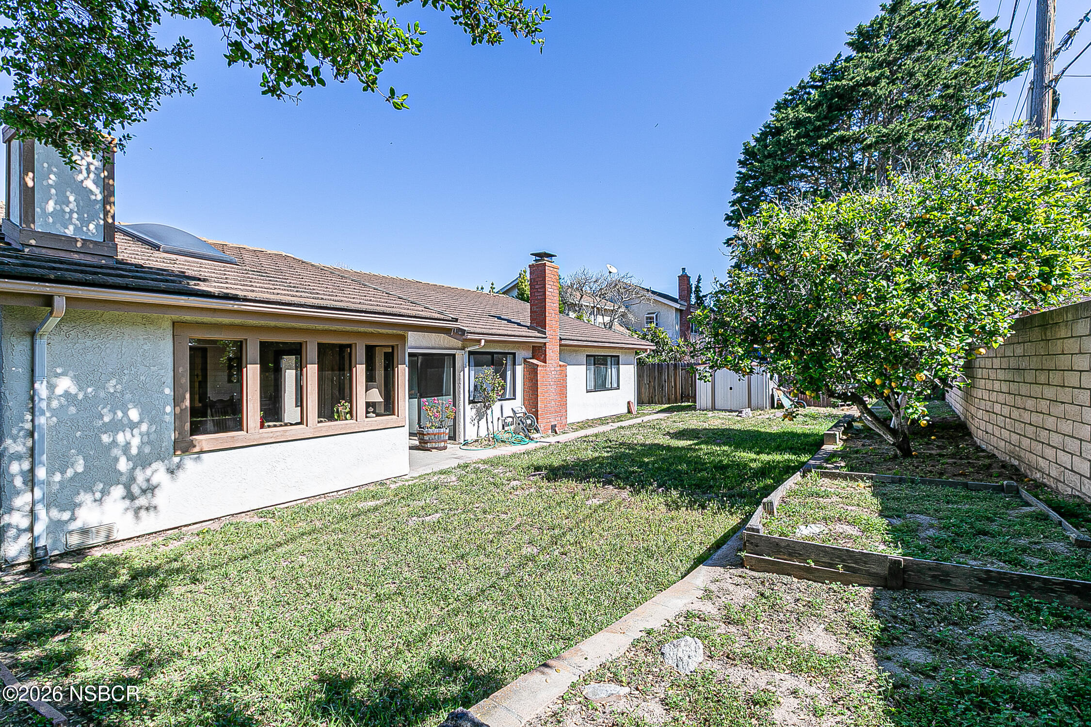 4447 Falcon Drive Lompoc, CA 93436 - Photo 23 of 25 a front view of a house with a yard