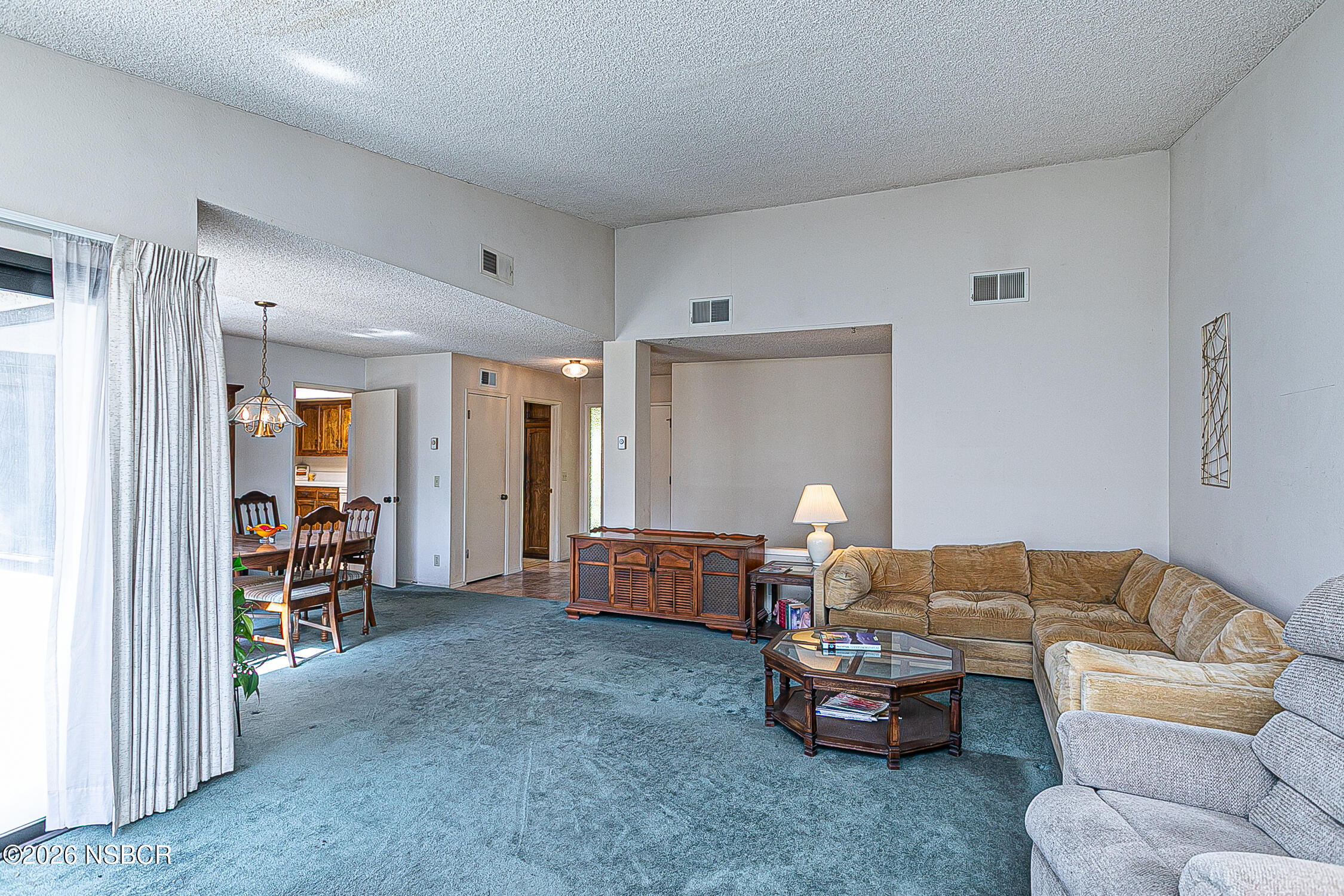 4447 Falcon Drive Lompoc, CA 93436 - Photo 3 of 25 a living room with furniture and a table