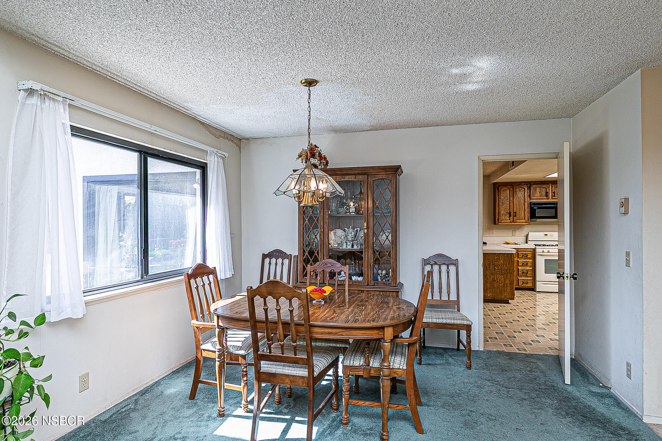 4447 Falcon Drive Lompoc, CA 93436 - Photo 5 of 25 a dining room with furniture window and wooden floor