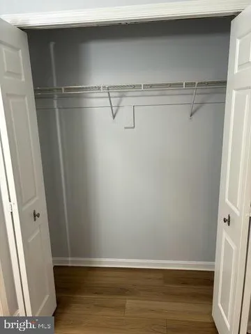 a view of a room with racks on the wall