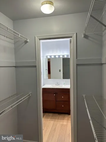 a bathroom with a sink and mirror