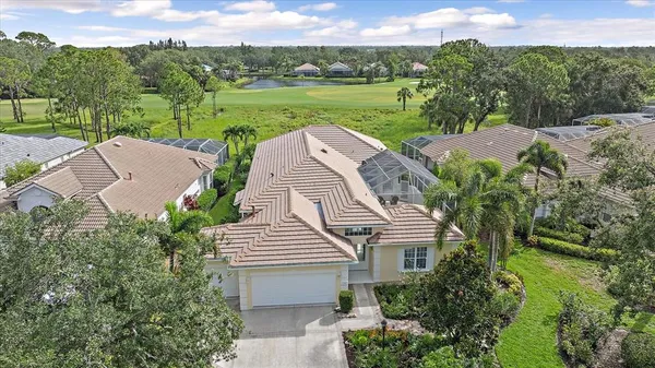 a view of a house with backyard porch and patio