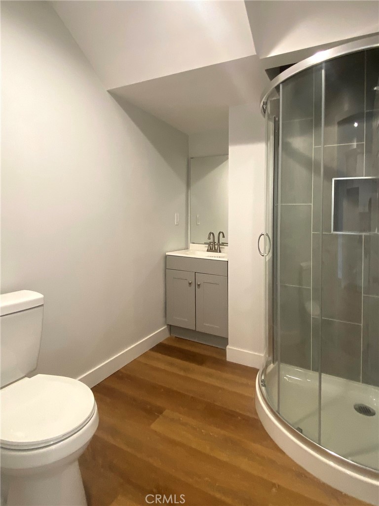 300 East Alhambra Road, Unit E Alhambra, CA 91801 - Photo 15 of 23 a bathroom with a sink toilet and shower