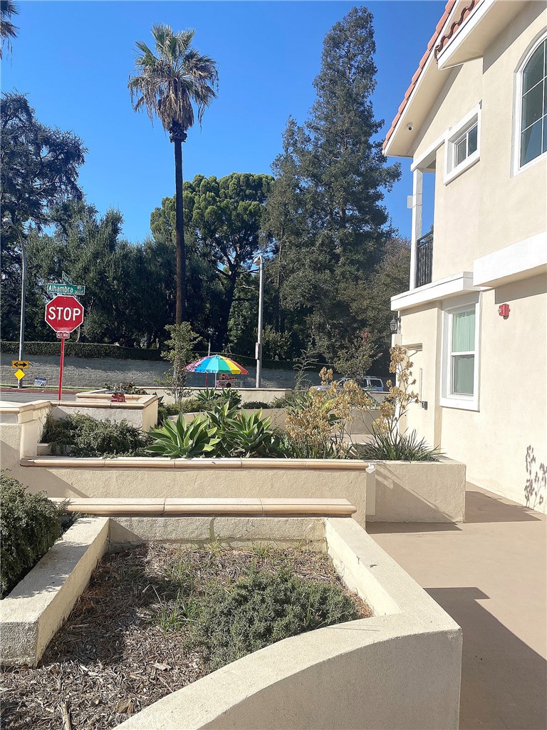 300 East Alhambra Road, Unit E Alhambra, CA 91801 - Photo 19 of 23 a view of a yard with cars