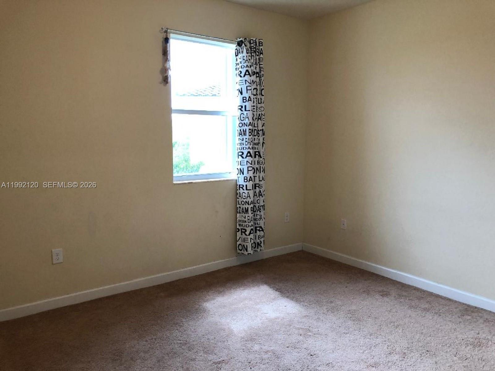 17000 Southwest 90th Terrace Miami, FL 33196 - Photo 22 of 56 an empty room with windows