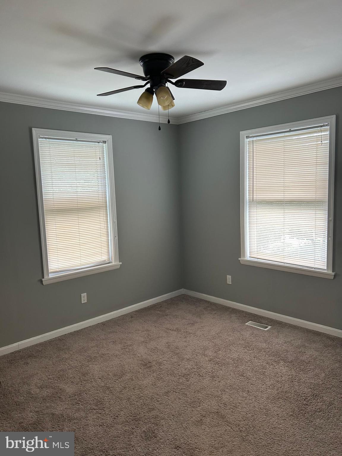 5216 Tramore Road Baltimore, MD 21214 - Photo 22 of 39 a view of an empty room with a window