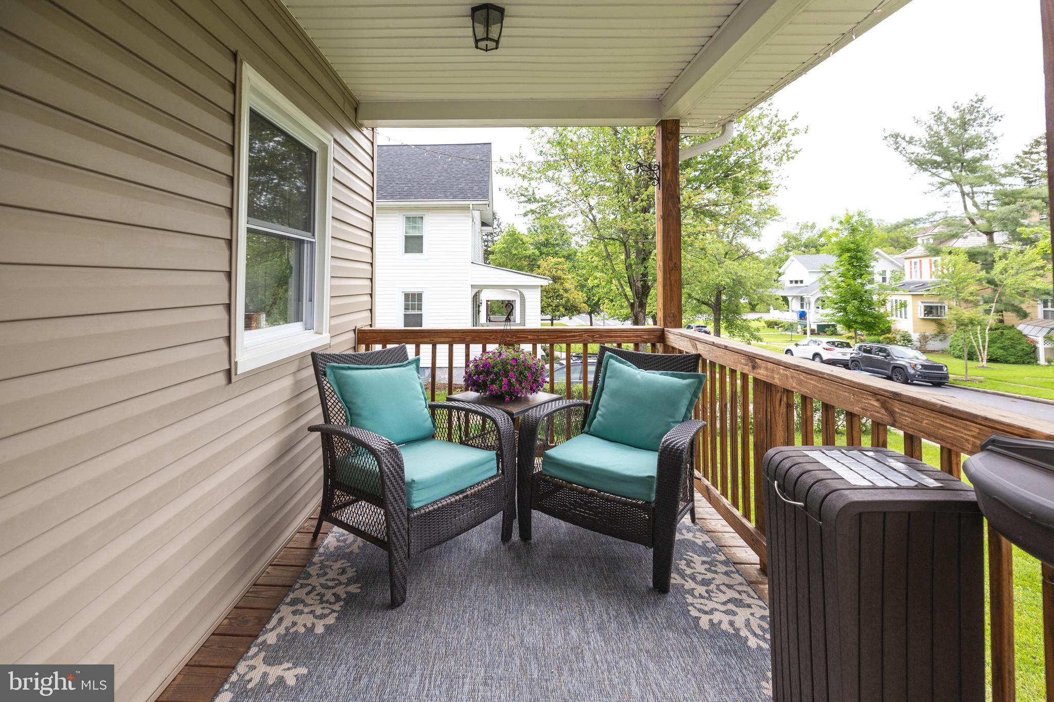 5216 Tramore Road Baltimore, MD 21214 - Photo 29 of 39 a view of a two chair in the balcony