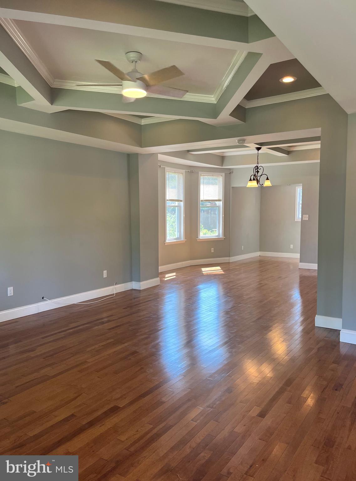 5216 Tramore Road Baltimore, MD 21214 - Photo 9 of 39 a view of livingroom and hardwood floor