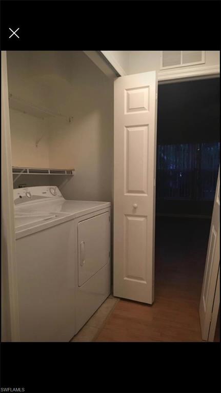 884 Hampton Circle, Unit 159 Naples, FL 34105 - Photo 17 of 28 a view of washer and dryer