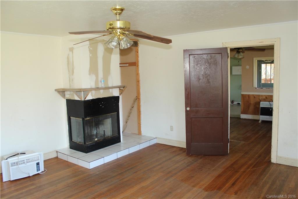 2013 Union Road Rutherfordton, NC 28139 - Photo 11 of 21 a living room with furniture and a fireplace