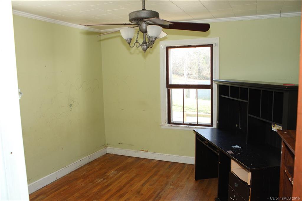 2013 Union Road Rutherfordton, NC 28139 - Photo 12 of 21 a view of a livingroom with a window and wooden floor
