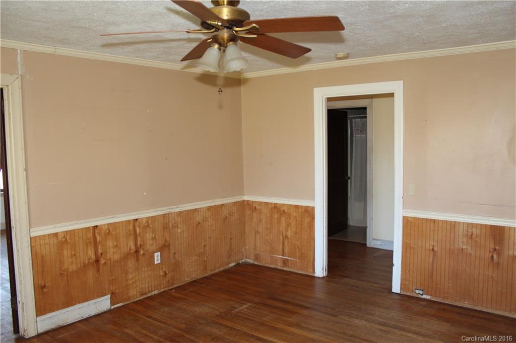 2013 Union Road Rutherfordton, NC 28139 - Photo 9 of 21 an empty room with wooden floor closet and fan