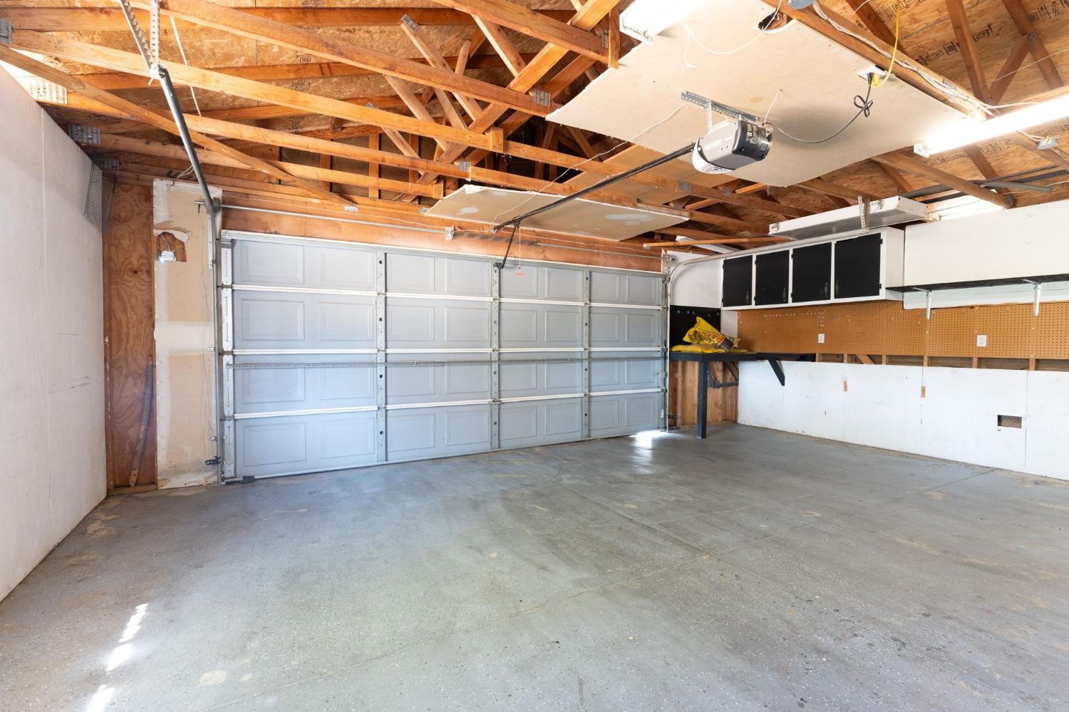 44909 Person Loop North Coarsegold, CA 93614 - Photo 28 of 32 a view of a room with racks on the wall