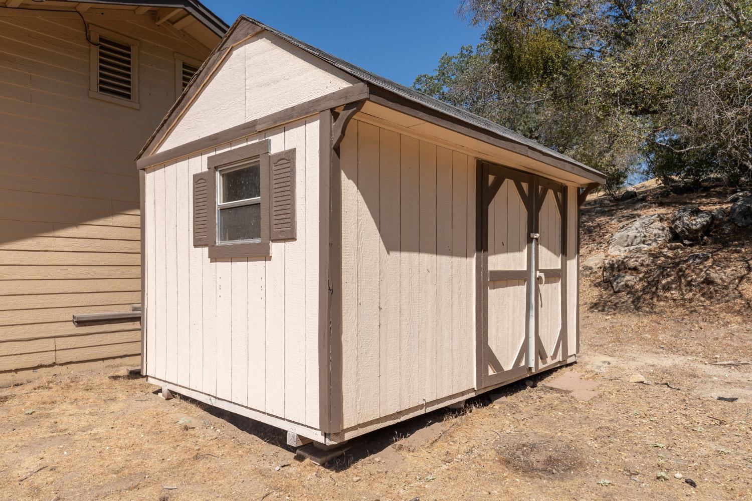 44909 Person Loop North Coarsegold, CA 93614 - Photo 32 of 32 a view of a house with backyard