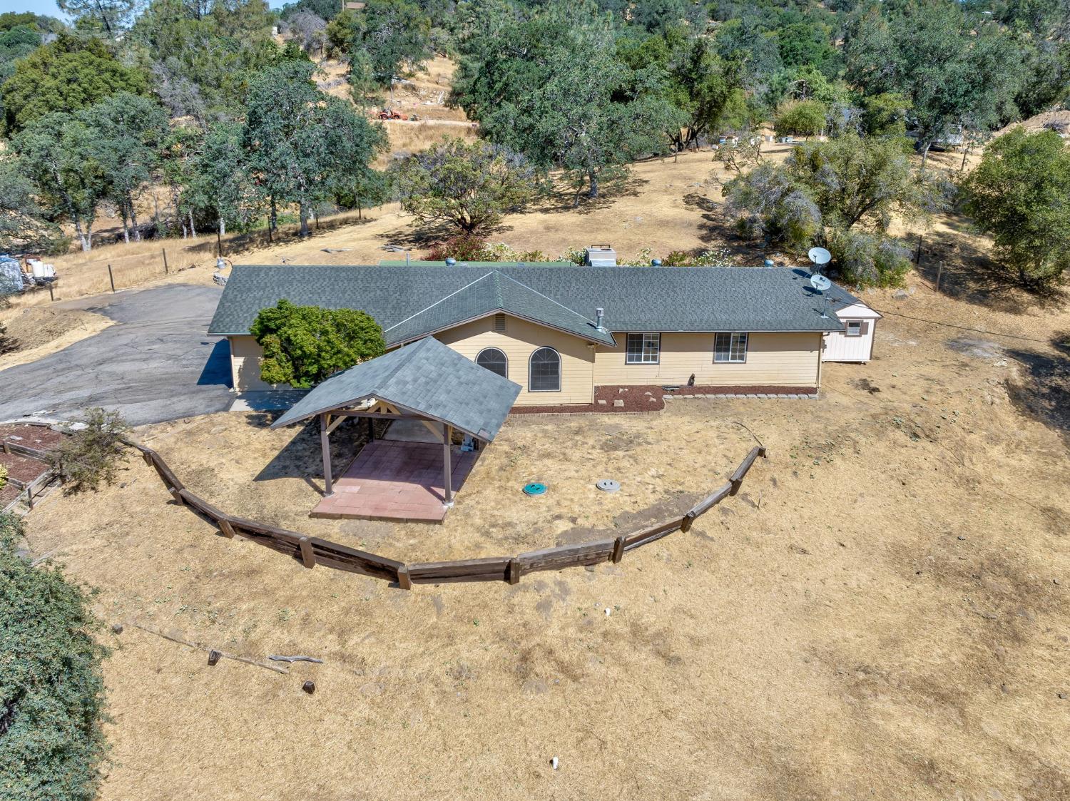 44909 Person Loop North Coarsegold, CA 93614 - Photo 5 of 32 a view of a houses with yard