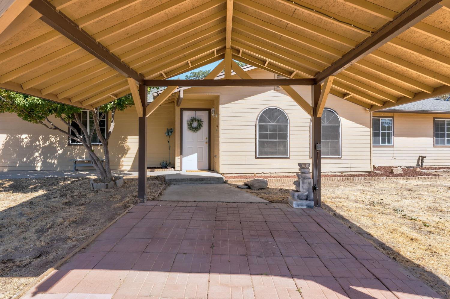44909 Person Loop North Coarsegold, CA 93614 - Photo 7 of 32 a view of a house with wooden floor