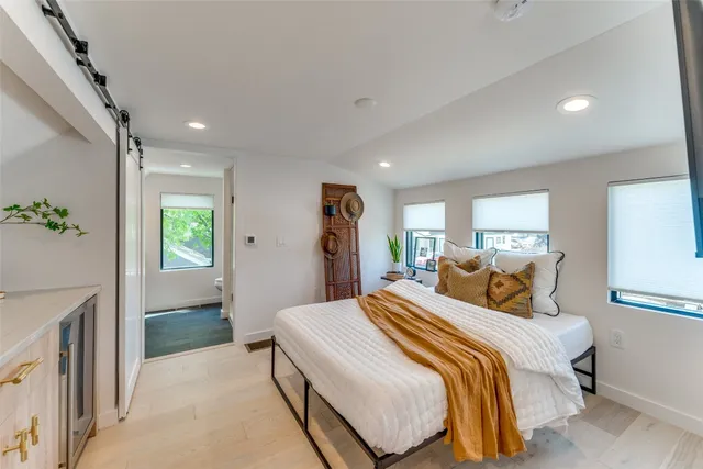 a room with furniture and gym equipment