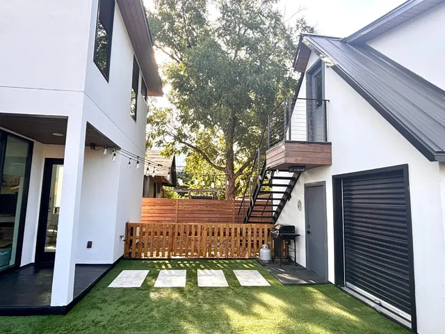 a front view of a house with garage