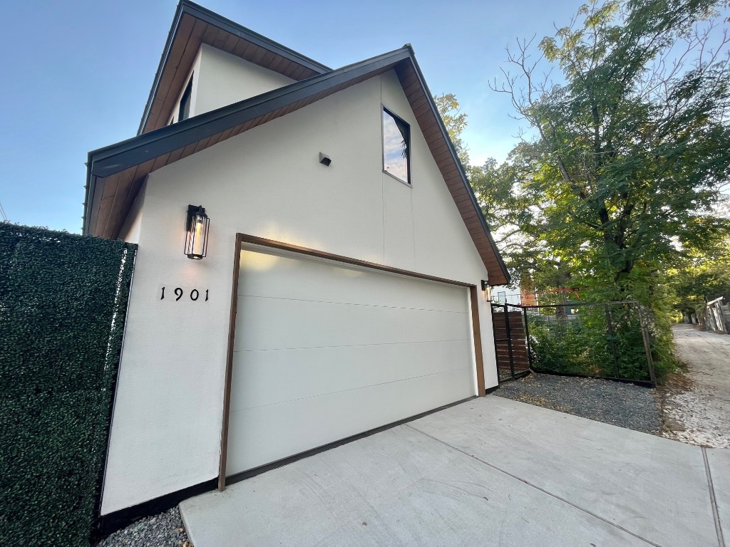 1901 Hamilton Avenue Austin, TX 78702 - Photo 29 of 37 a front view of a house with garage
