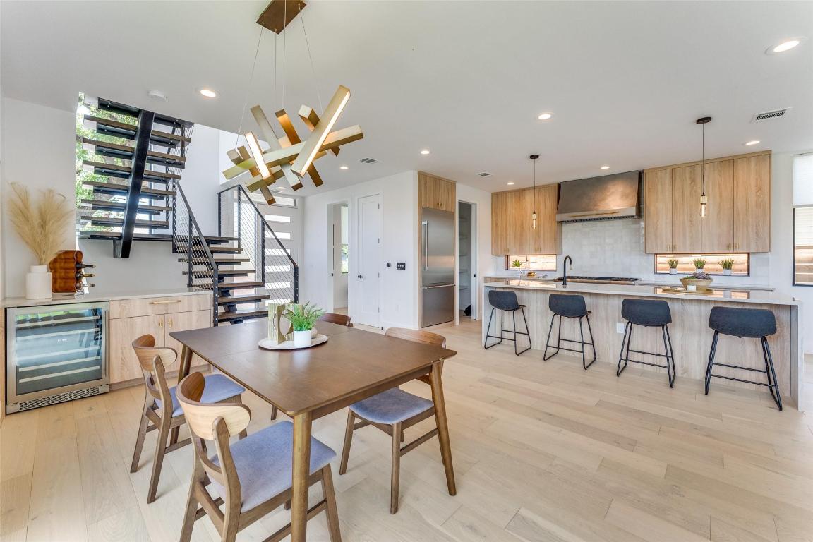 1901 Hamilton Avenue Austin, TX 78702 - Photo 4 of 37 a view of a dining room with furniture and wooden floor