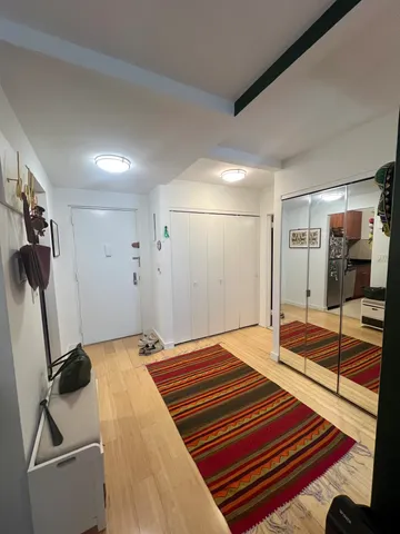 a bedroom with a bed and a walk in closet