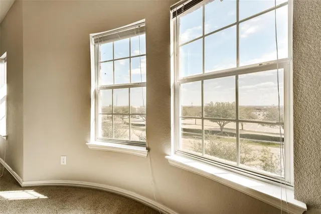 a bathroom with a tub a sink and a shower