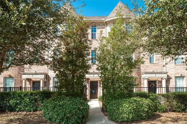 a view of a building with a garden