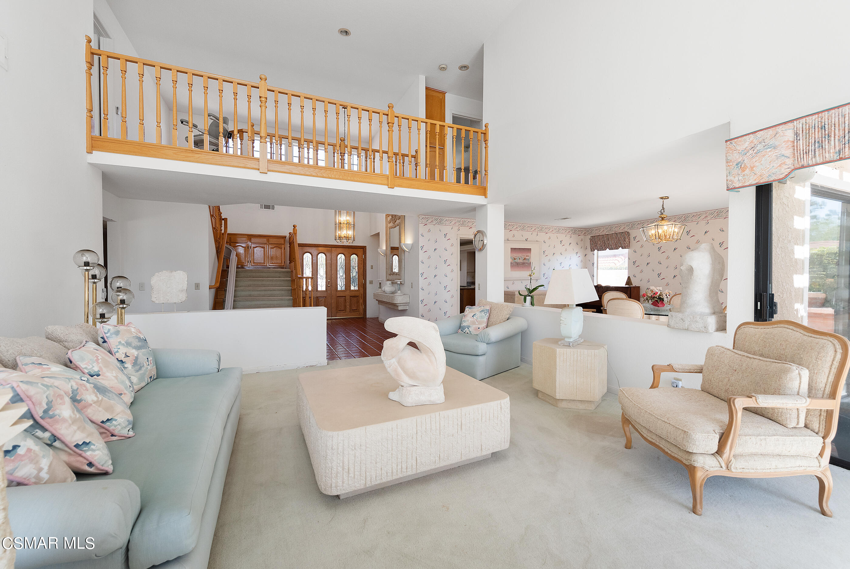 Undisclosed Address Simi Valley, CA 93063 - Photo 12 of 69 a living room with furniture a rug and a chandelier