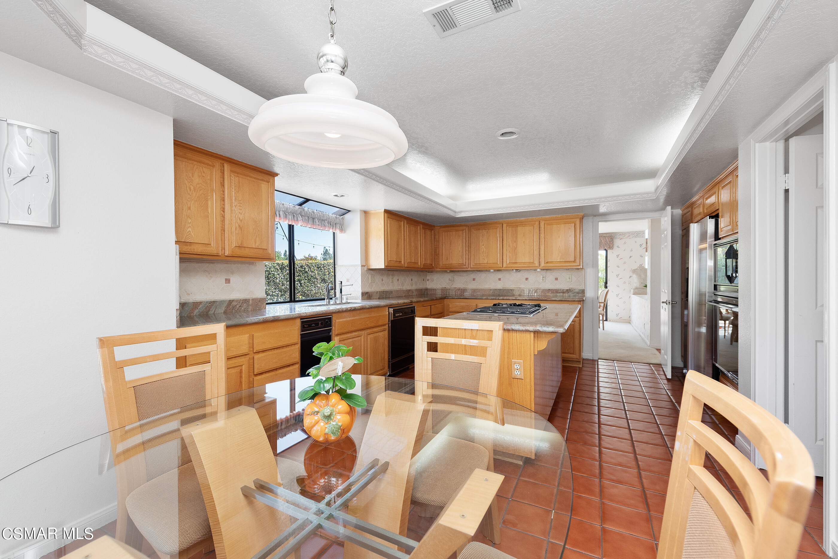 Undisclosed Address Simi Valley, CA 93063 - Photo 18 of 69 a kitchen with stainless steel appliances granite countertop a refrigerator a sink dishwasher and white countertops with wooden floor