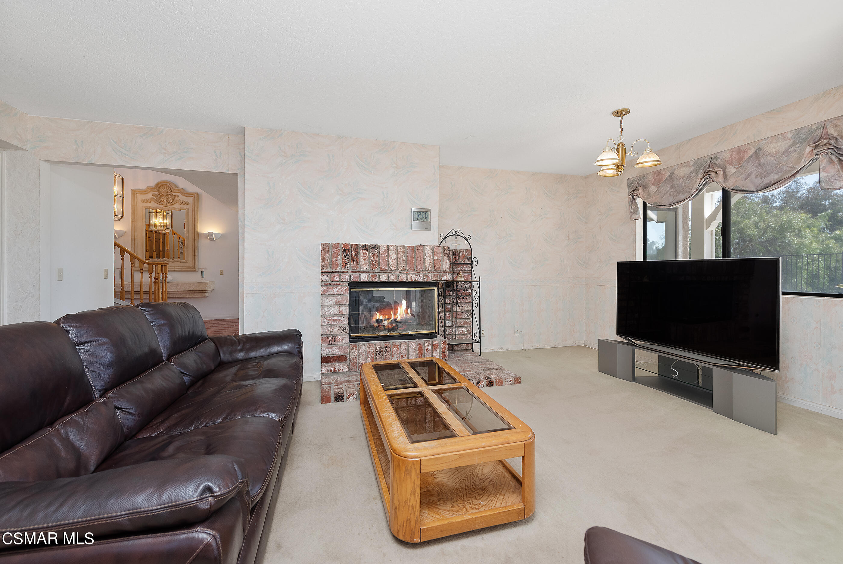 Undisclosed Address Simi Valley, CA 93063 - Photo 22 of 69 a living room with furniture and a flat screen tv