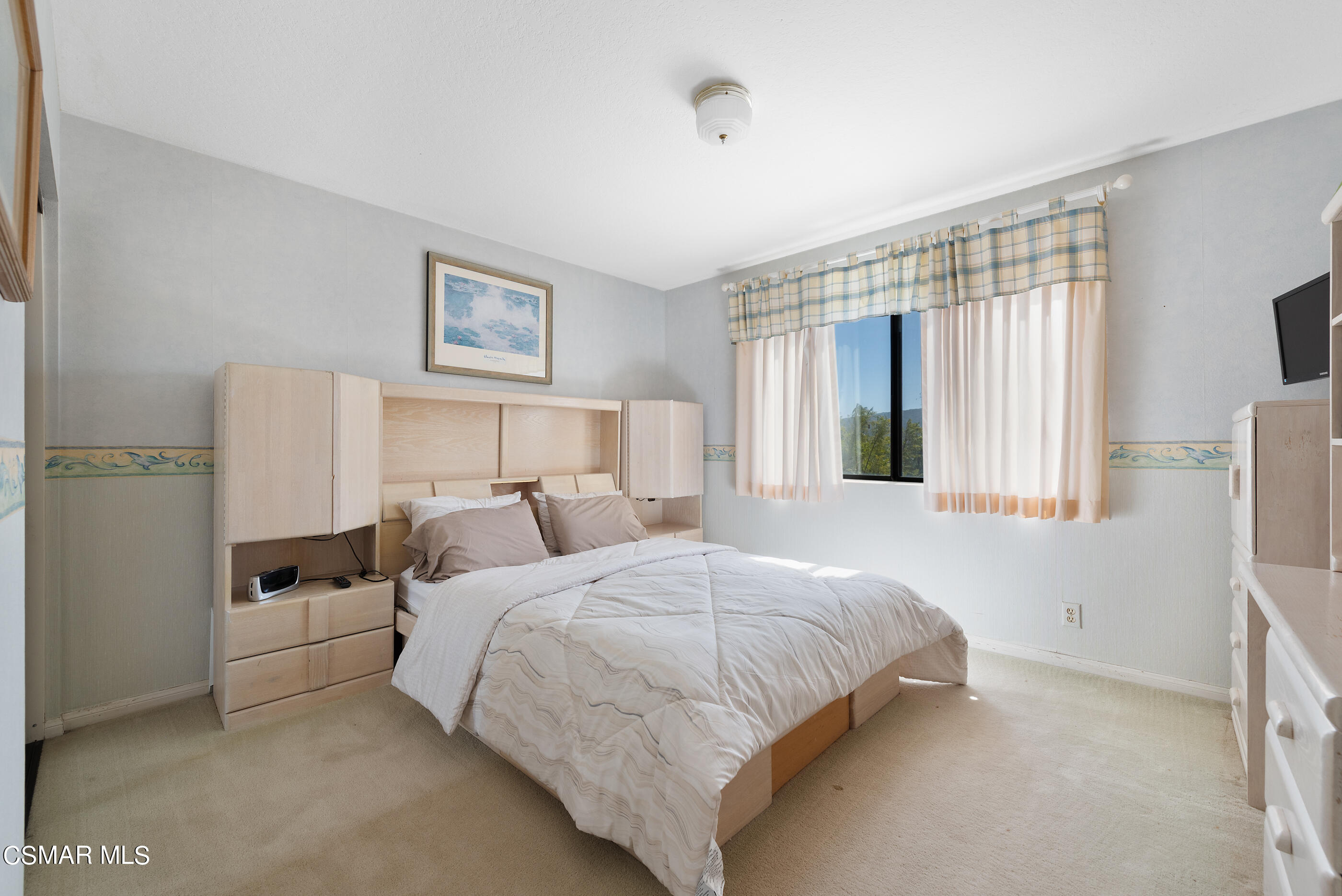 Undisclosed Address Simi Valley, CA 93063 - Photo 28 of 69 a bedroom with bed and a window