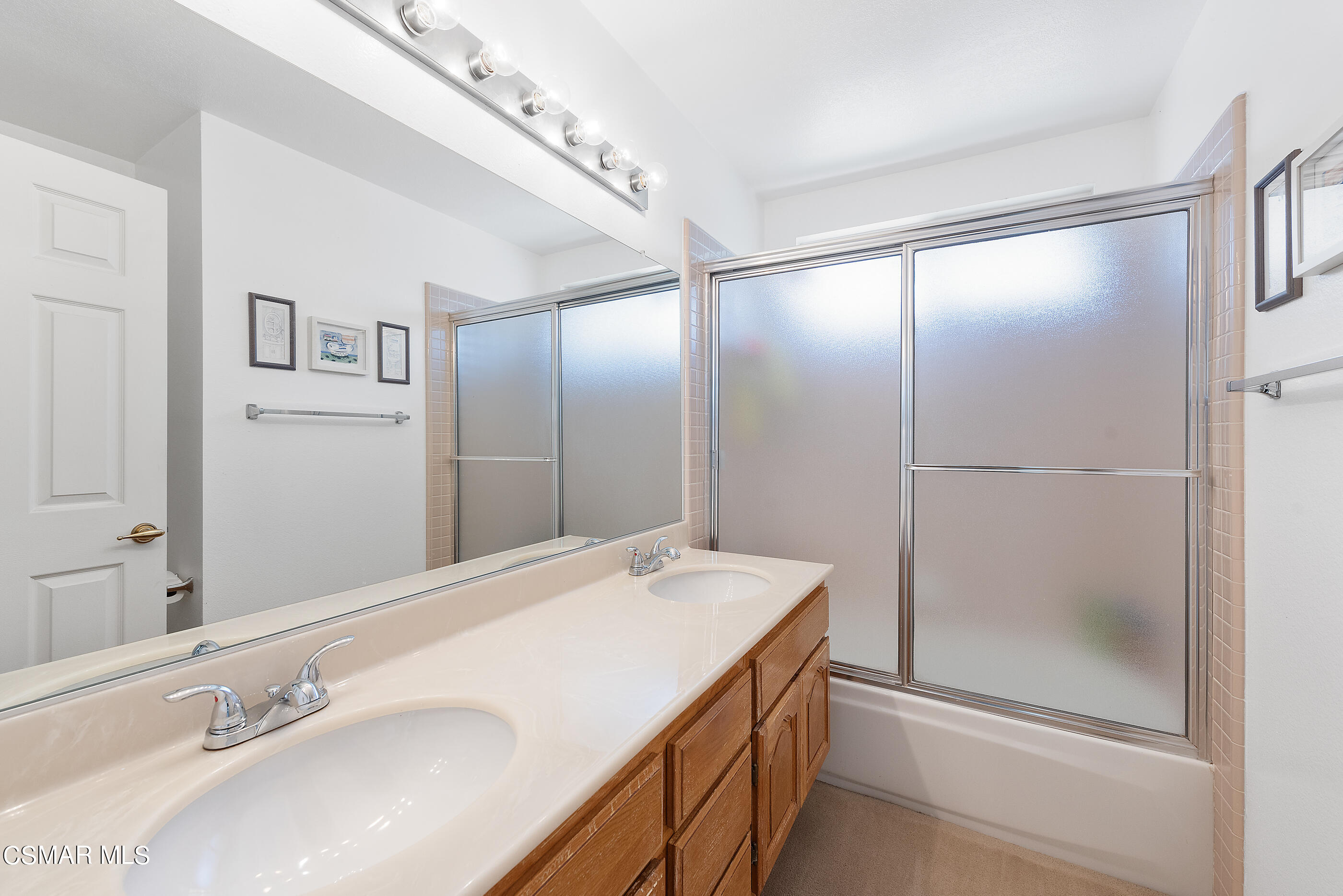 Undisclosed Address Simi Valley, CA 93063 - Photo 29 of 69 a bathroom with a sink and a mirror