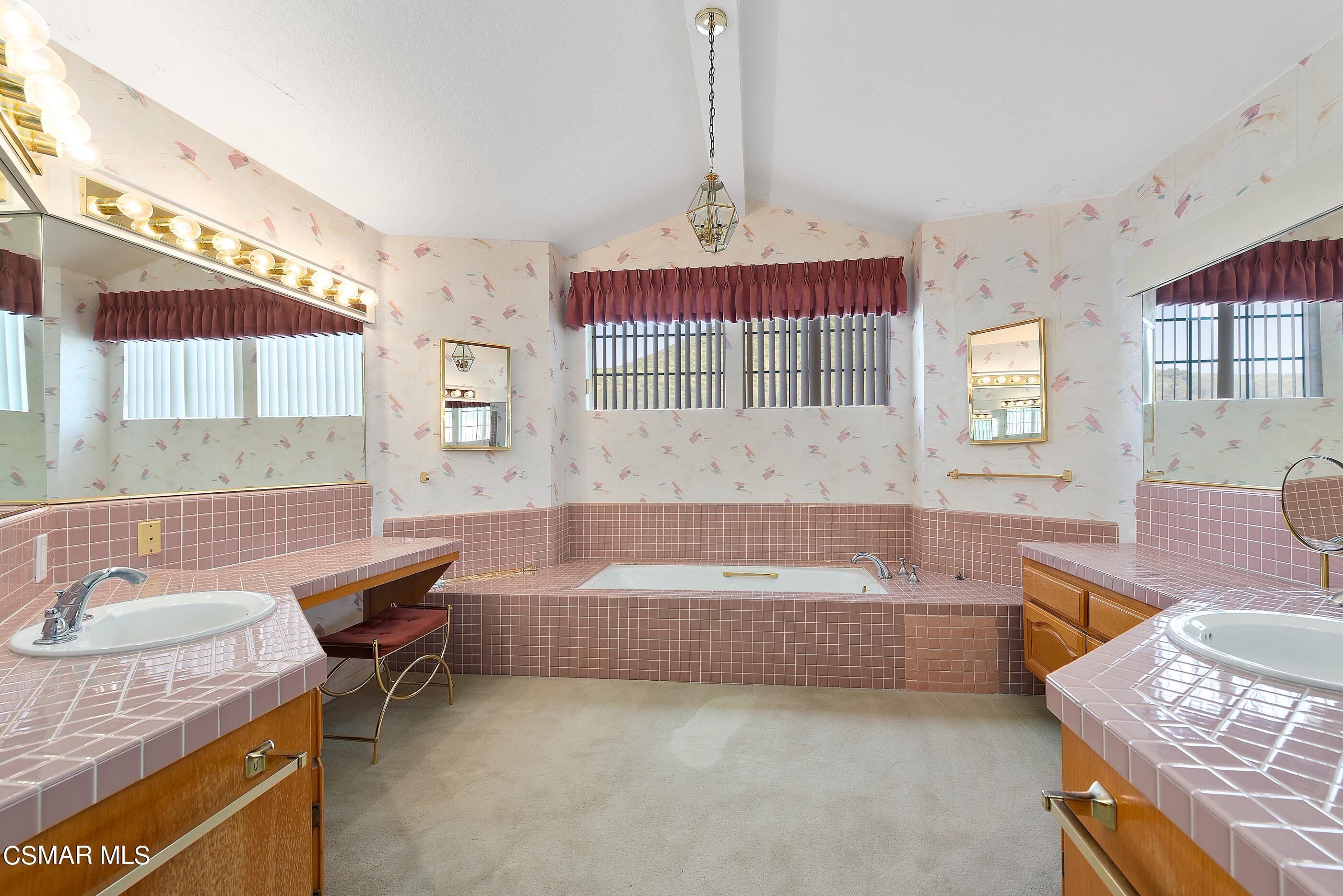 Undisclosed Address Simi Valley, CA 93063 - Photo 35 of 69 a bathroom with a tub sink and mirror