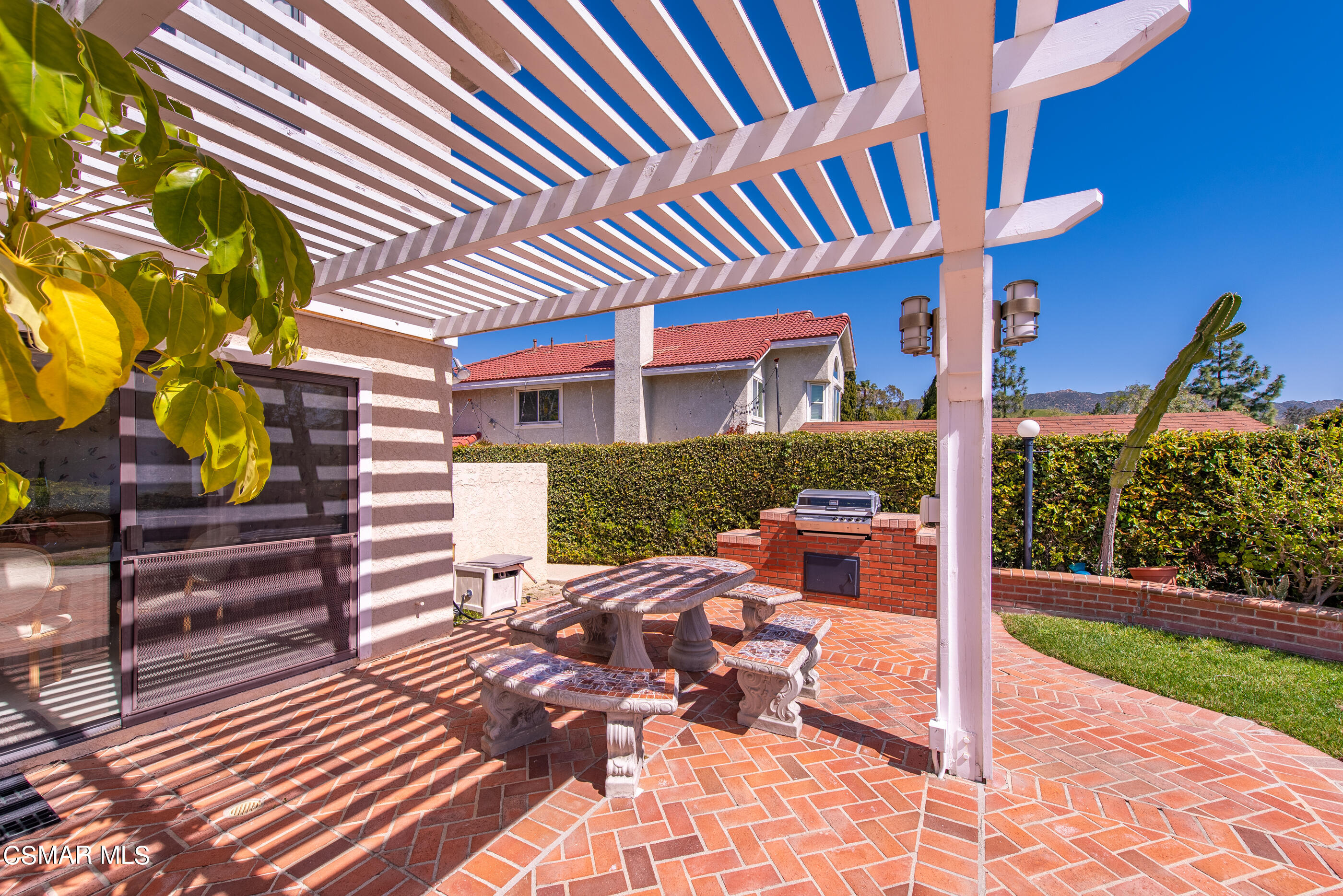 Undisclosed Address Simi Valley, CA 93063 - Photo 44 of 69 a view of a patio with table and chairs with wooden floor and fence