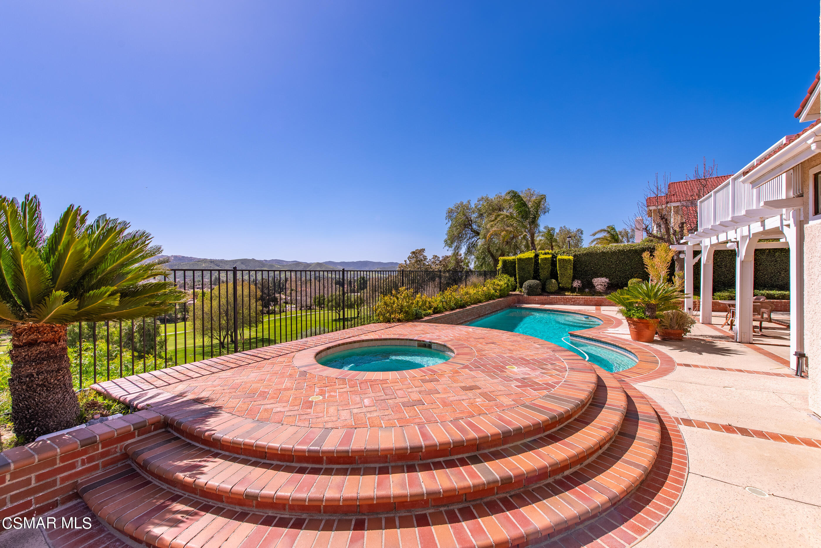 Undisclosed Address Simi Valley, CA 93063 - Photo 48 of 69 a view of a swimming pool with a patio