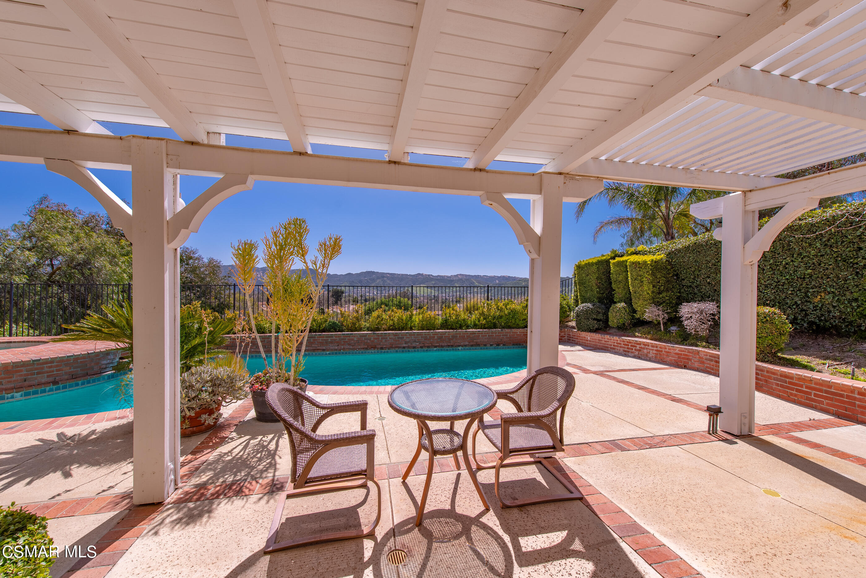 Undisclosed Address Simi Valley, CA 93063 - Photo 55 of 69 a view of a swimming pool with a patio