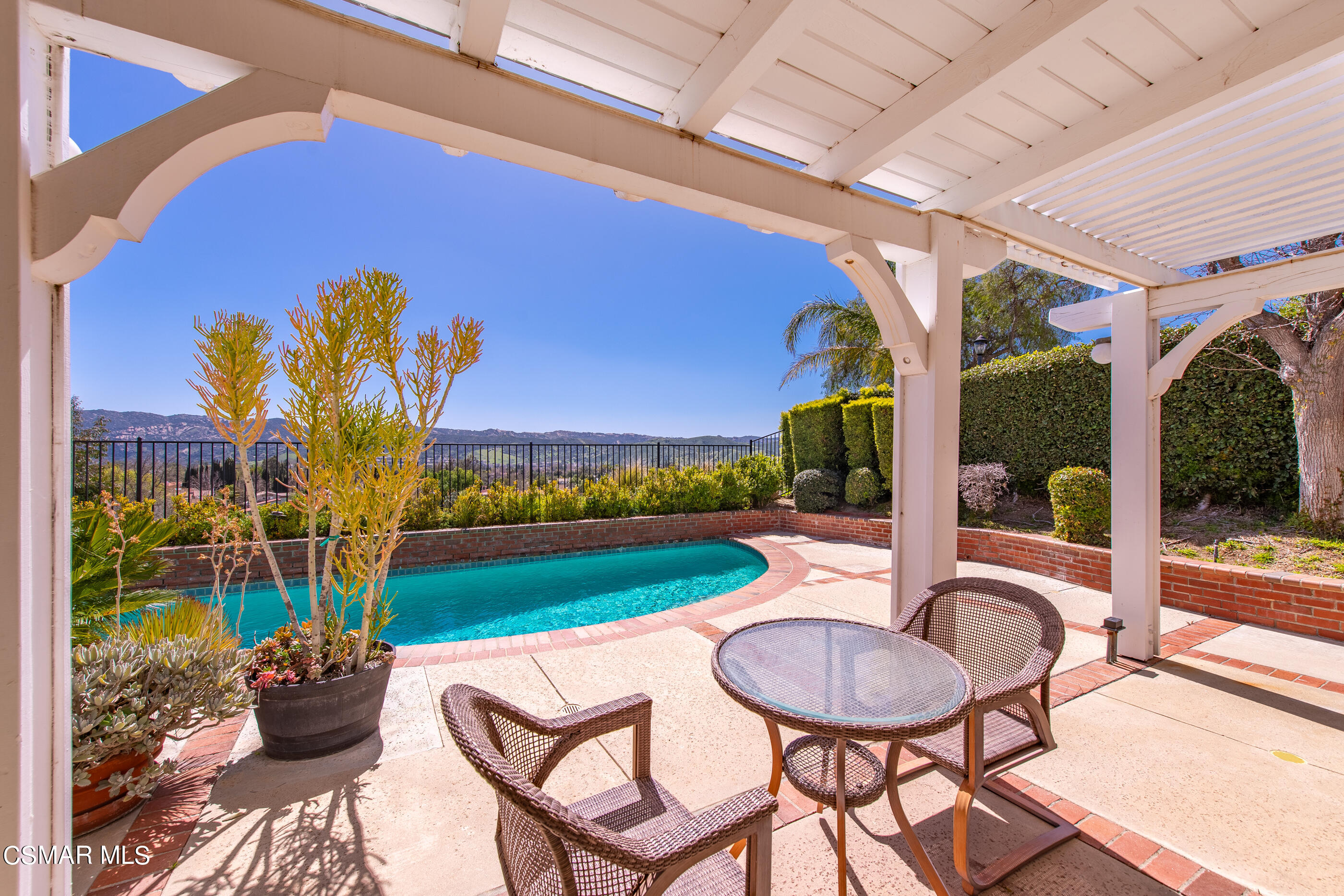 Undisclosed Address Simi Valley, CA 93063 - Photo 56 of 69 a view of a porch with furniture and a backyard