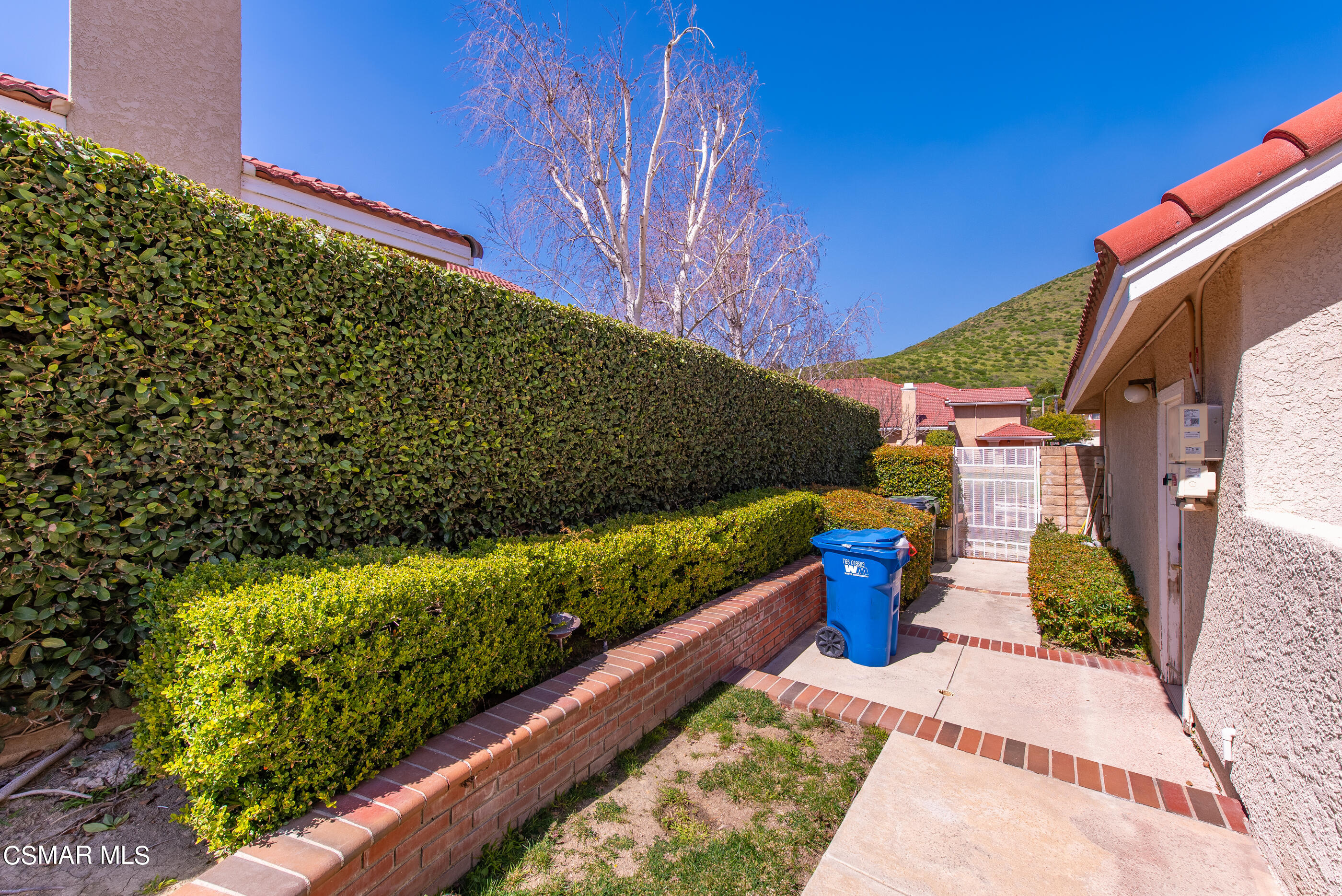 Undisclosed Address Simi Valley, CA 93063 - Photo 59 of 69 a view of a garden with flowers