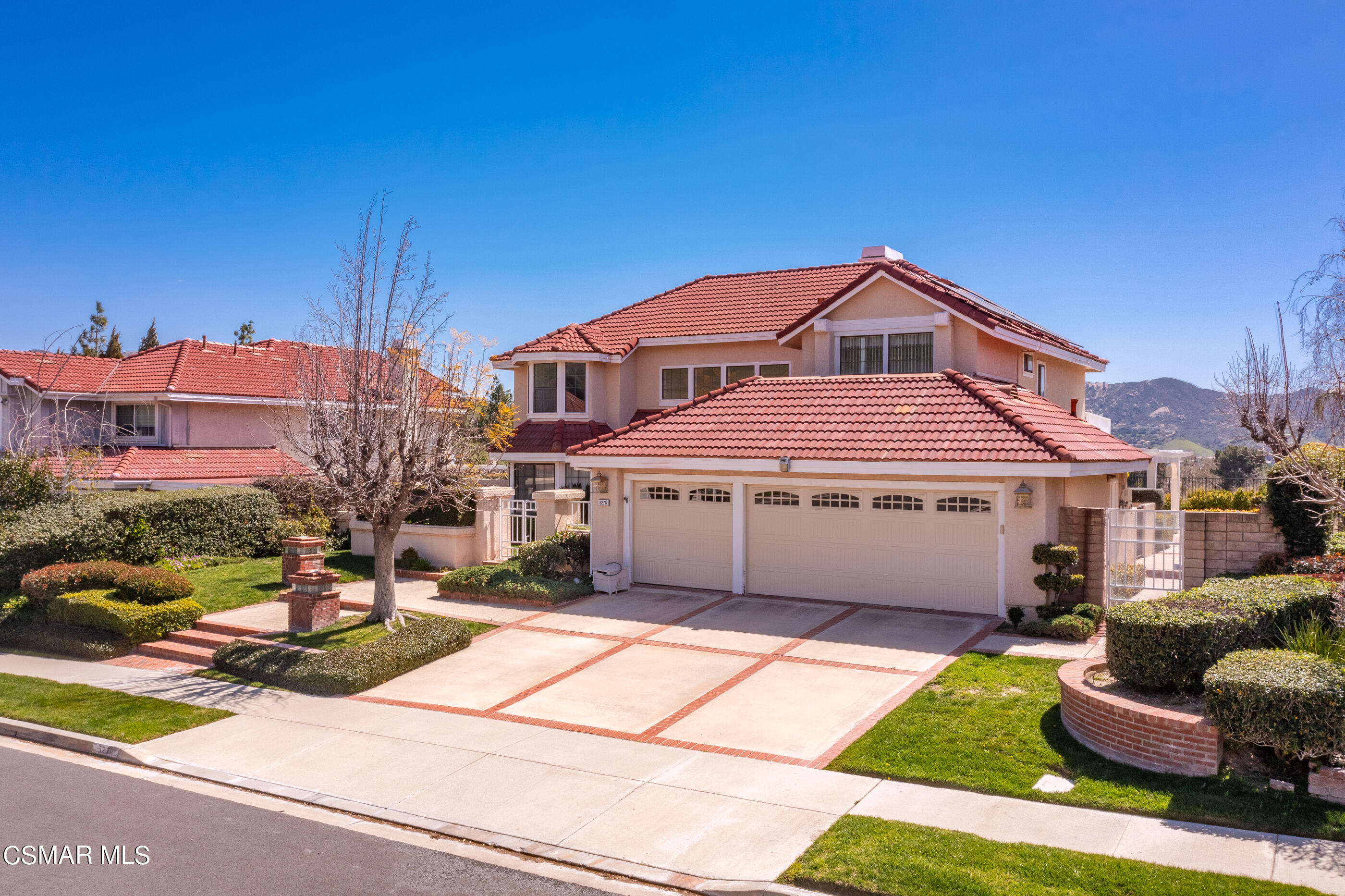Undisclosed Address Simi Valley, CA 93063 - Photo 60 of 69 a front view of a house with a garden