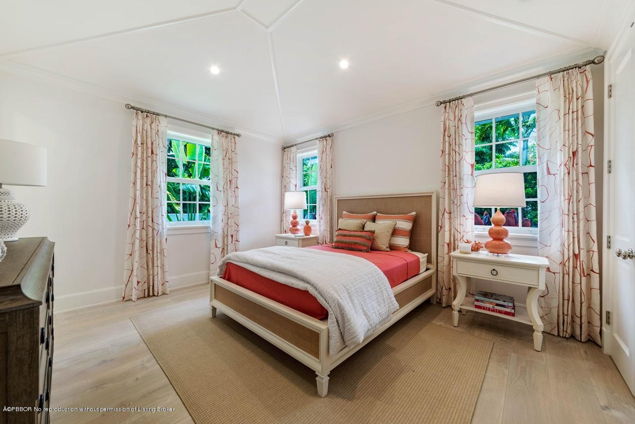 225 Arabian Road Palm Beach, FL 33480 - Photo 11 of 14 a spacious bedroom with a bed and a window